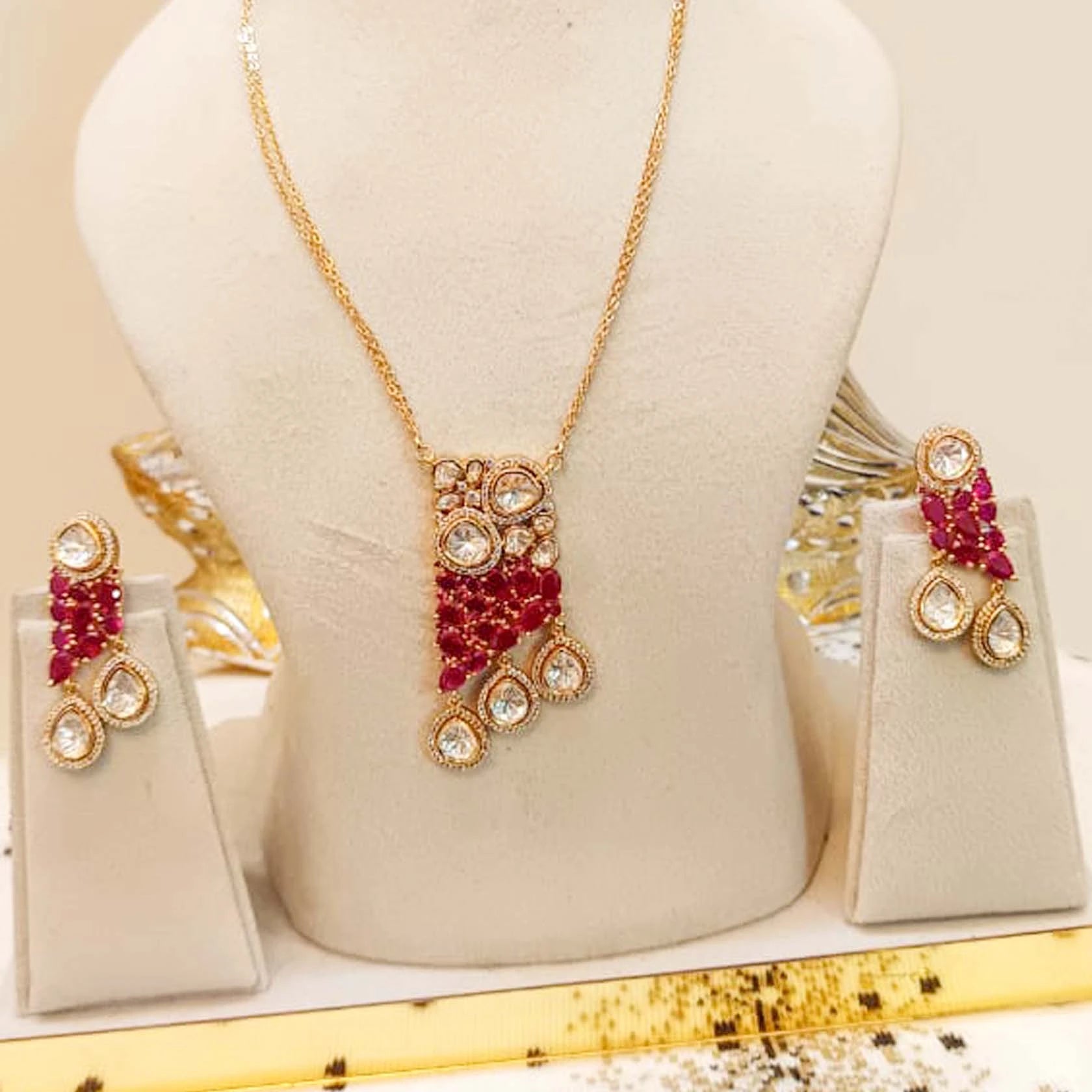 Tyaani-Kundan-With-Ruby-Premium-Quality-Real-Look-Pendant-Set