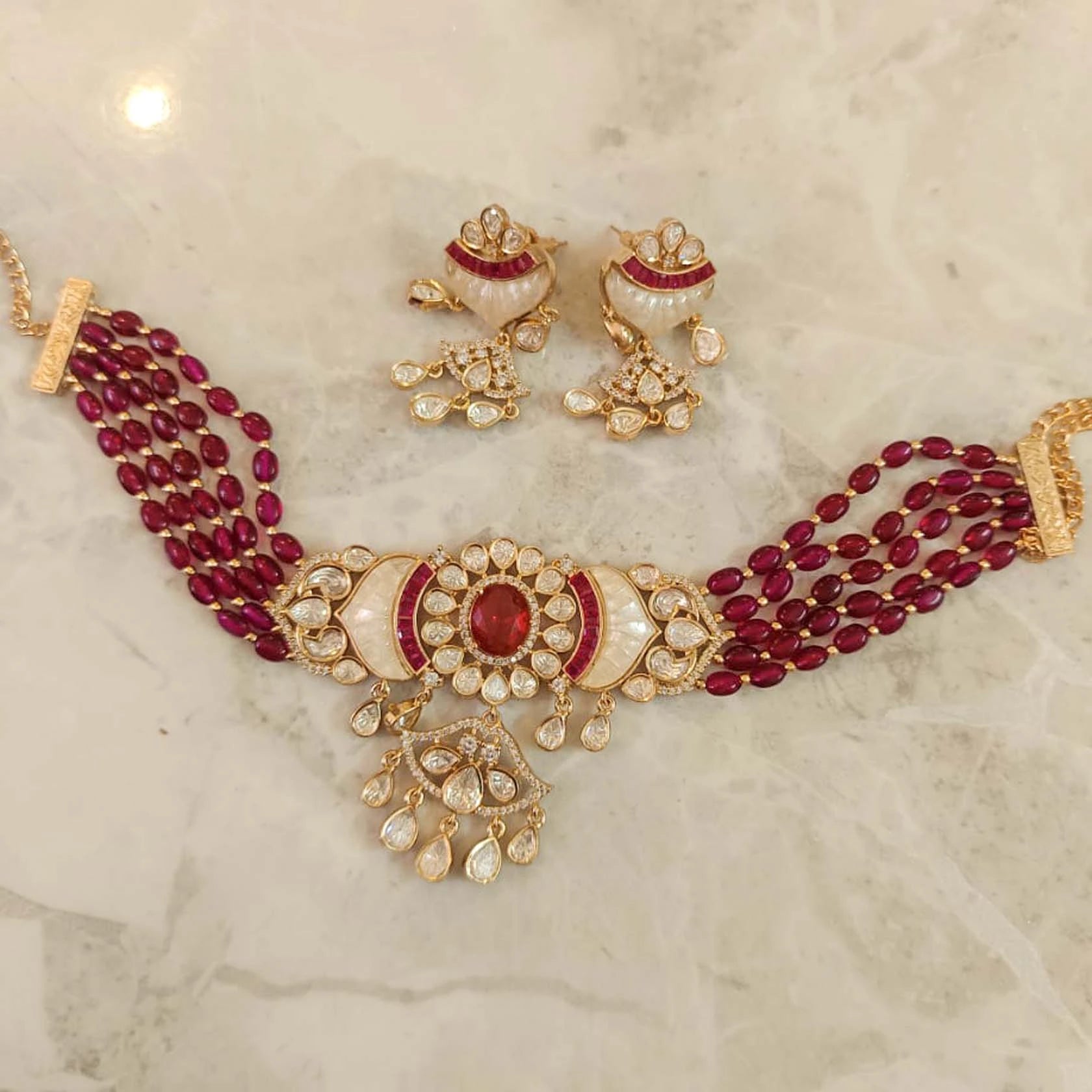 Tyaani-Kundan-With-Onyx-Beads-Premium-Real-Look-Choker-Set